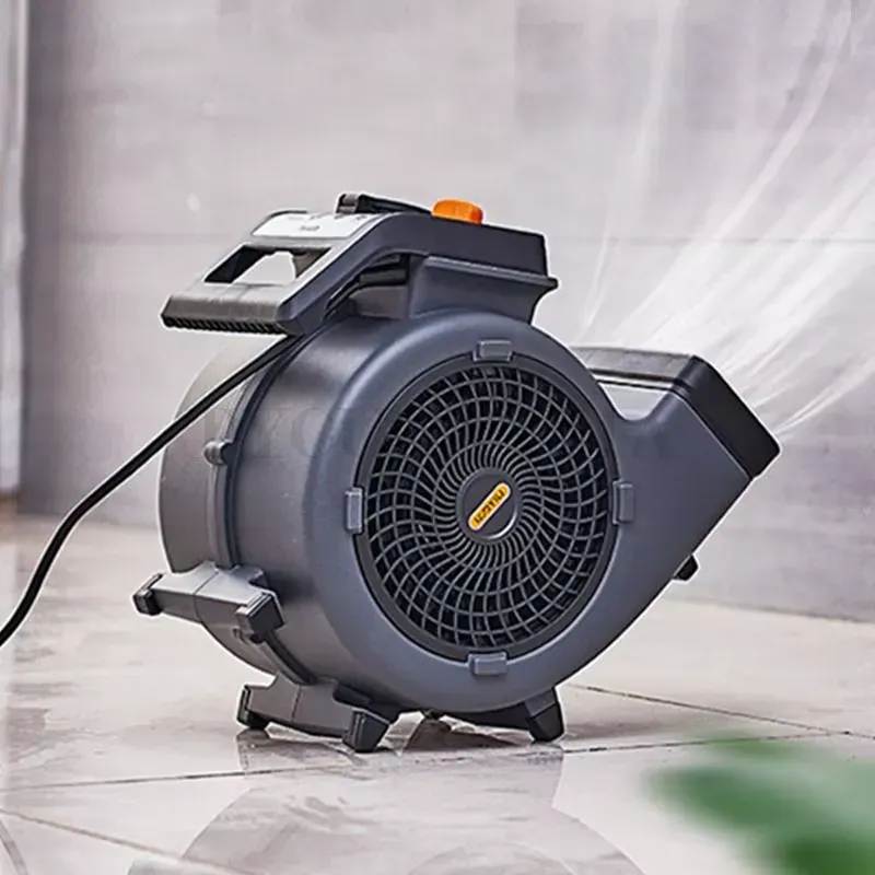 Lightweight 150W Ground Blower drying a wet floor in a garage