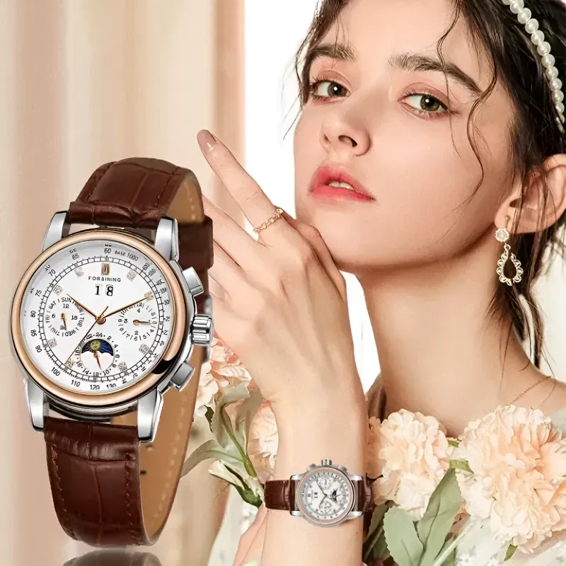 FORSINING women automatic watch with moon phase in woman hands