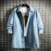 Men wearing light blue mid-length denim jacket with turn-down collar