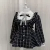Front view of the black and white plaid Kawaii Lolita dress on a mannequin, highlighting its design and details.