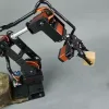 Metal Robotic Arm Kit - with MG996R for PS2 Programming - A close-up of a sleek, modular robotic arm with metal components, MG996R servos, and PS2 controller compatibility.