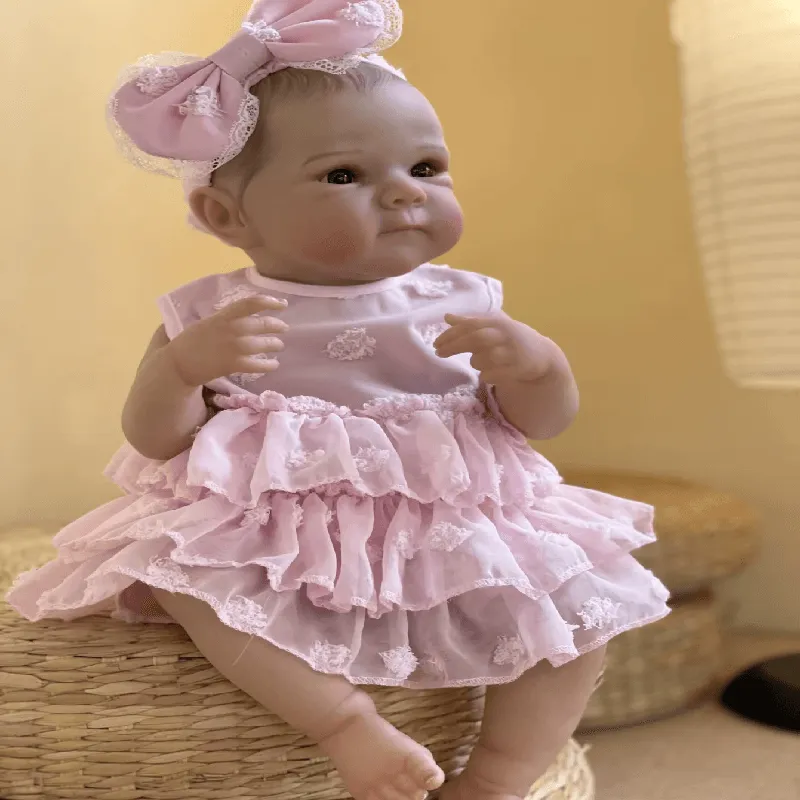 Full Body Reborn Doll - 18 Inch Lifelike Vinyl Newborn Girl - A close-up of a lifelike doll with hand-painted details, soft vinyl material, and realistic proportions.