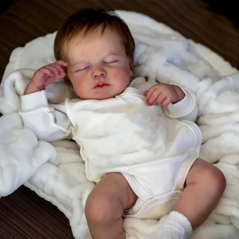 LouLou Reborn Baby Doll - 20 Inch Full Body Silicone Vinyl - A close-up of a lifelike doll with hand-painted details, soft silicone skin, and multicolor design.