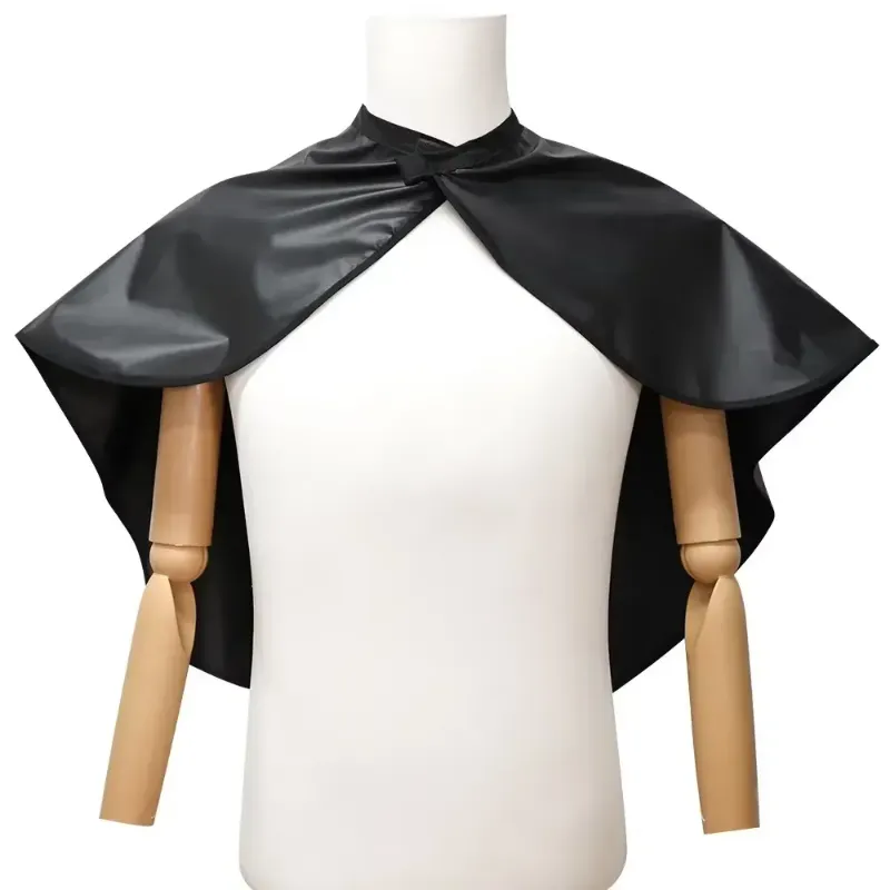 Front view of the black waterproof hairdressing cape on a mannequin