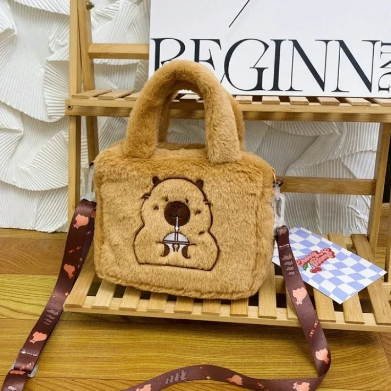 Capybara Plush Bag Displayed on a Wooden Rack – Highlighting Its Fluffy Texture.