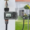 Intelligent irrigation watering system securely mounted on a faucet, providing precise control over watering schedules.