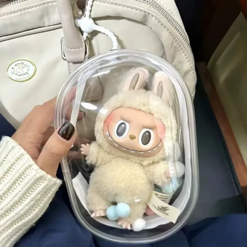 Labubu Vinyl Plush Bag holding a plush doll with soft white fur and blue accents.