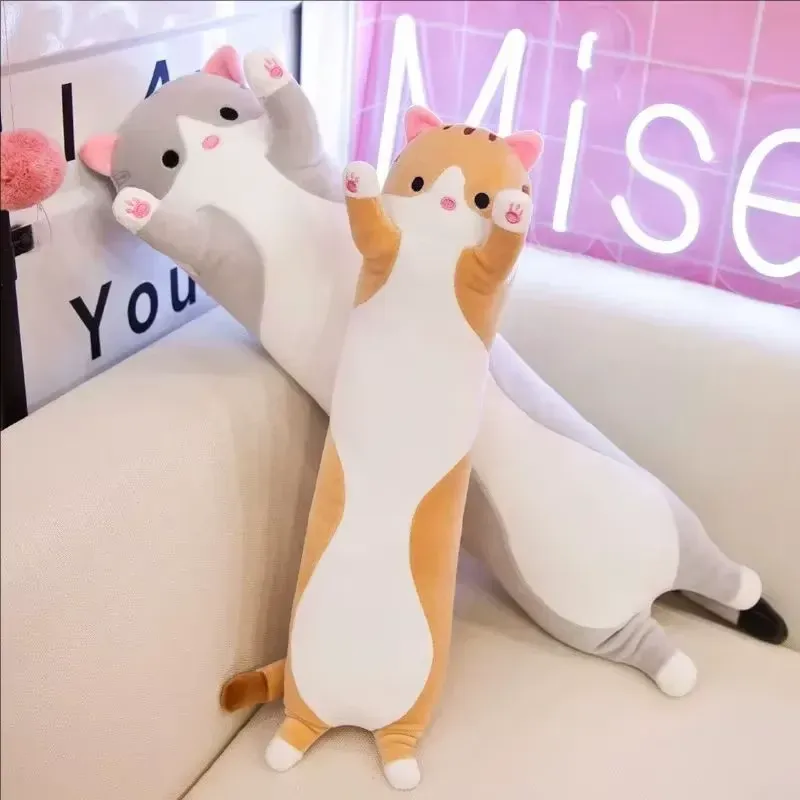 Adorable Long Cat Plush Toys sitting on a couch, showcasing their cute and cozy designs.