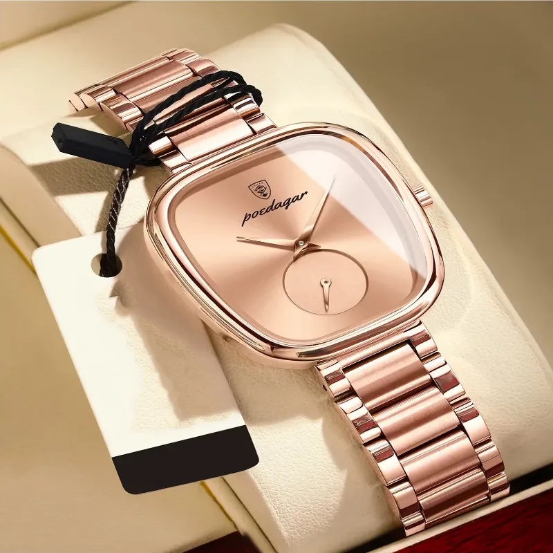 A stunning Luxury Waterproof Women's Watch with a rose gold stainless steel strap, displayed in elegant white packaging.