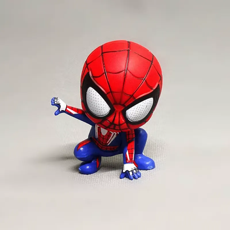 Spider-Man action figure in a poised stance, highlighting his bold red and blue suit.