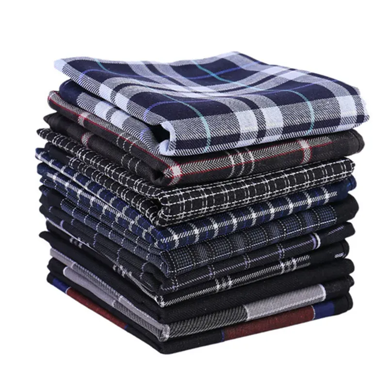 Stack of Men Cotton Pocket Squares featuring a variety of classic plaid patterns and colors.