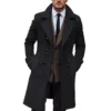 A dapper Men's Wool Trench Coat in black, paired with a white shirt and tie, showcasing its sleek design and commanding presence.