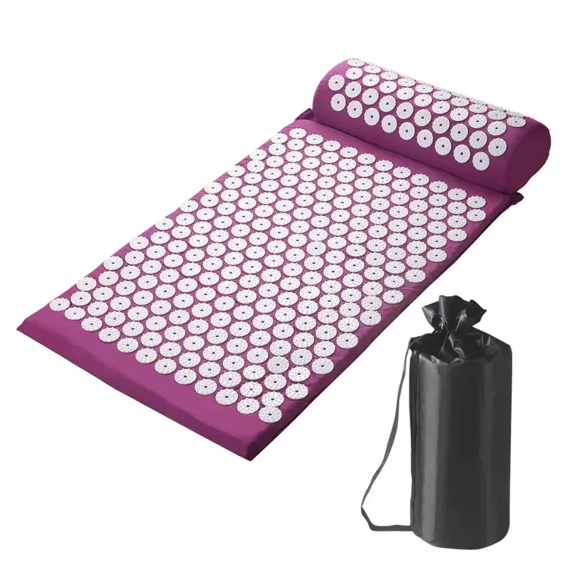 Purple yoga massage pad with textured white nubs and a convenient carrying bag.
