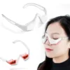Red Light Eye Therapy Glasses being worn by a person, showcasing the device's design and functionality.