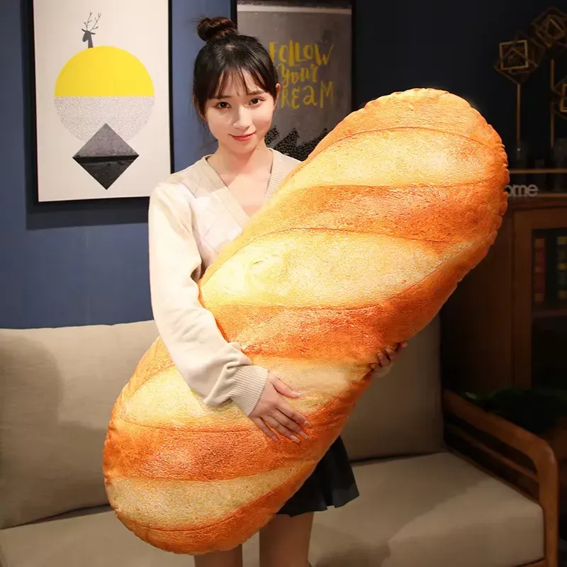 Person holding a large Toast Bread Pillow, emphasizing its size and realistic texture.