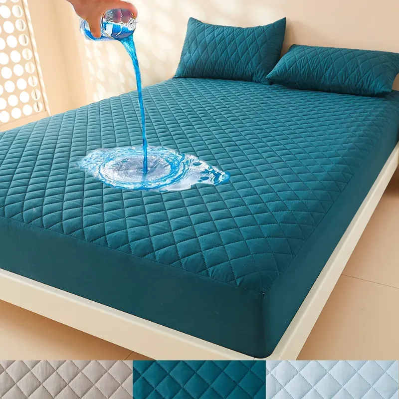 Waterproof mattress protector effectively repelling liquid to demonstrate its water-resistant properties.