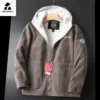 Close-up of wool blend fabric and embroidery on winter fashion coat for men