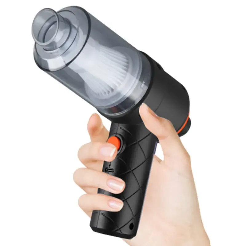 A hand holding the Wireless Auto Vacuum USB, showcasing its ergonomic grip and user-friendly design.
