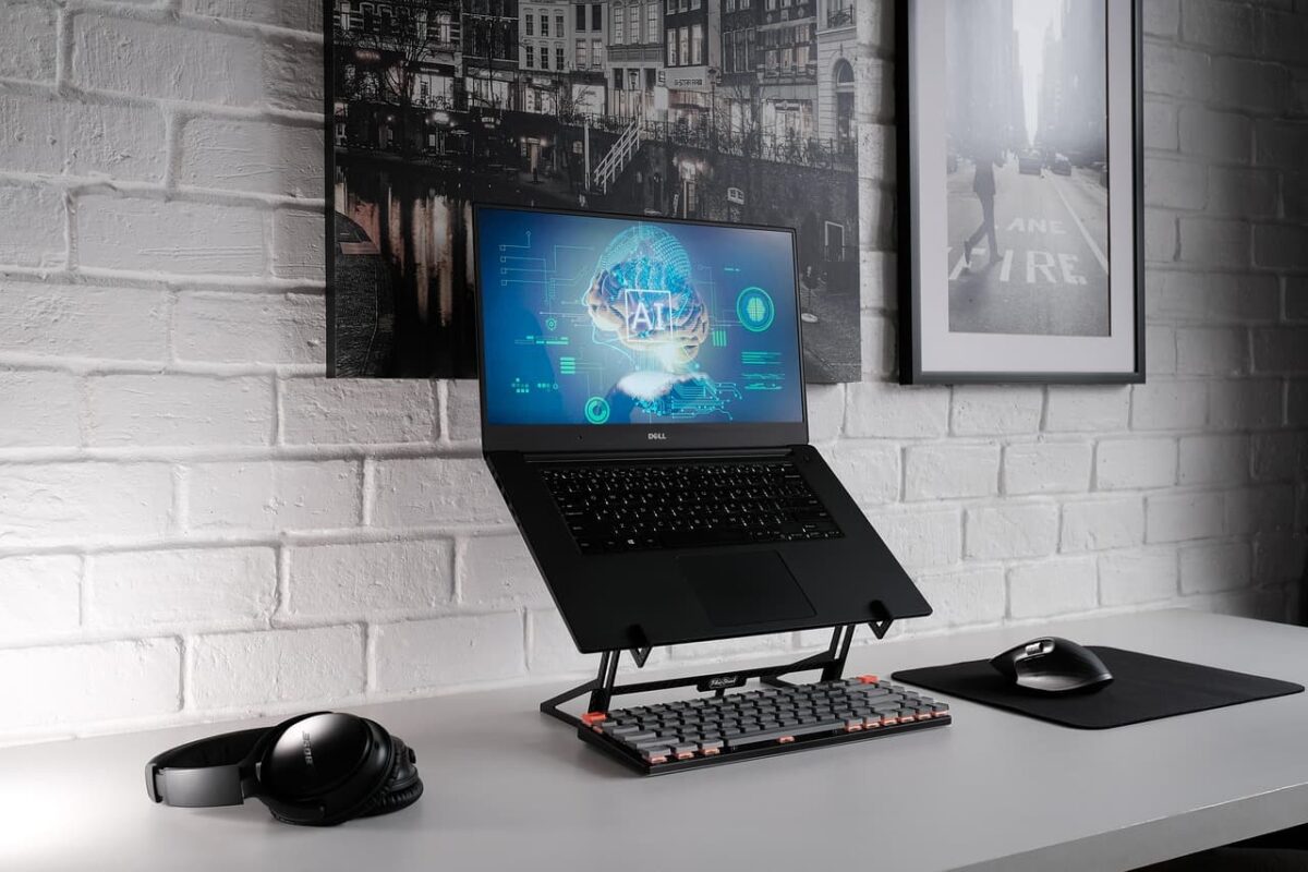 a laptop on the table with AI