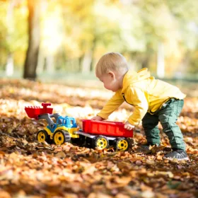 play is playing with a toytruck