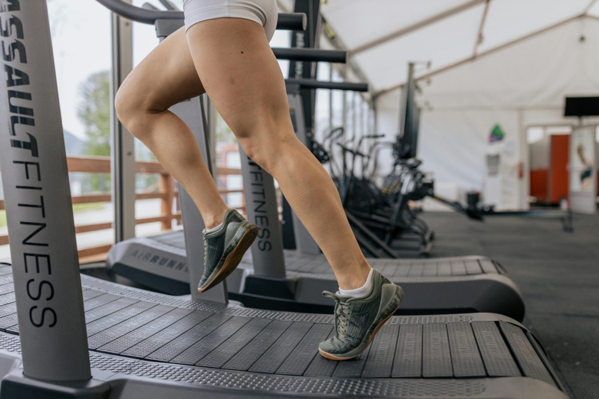 Cardio: a woman running on a treadmill