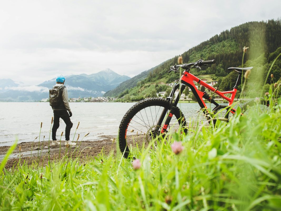 a man at the forest with his bike