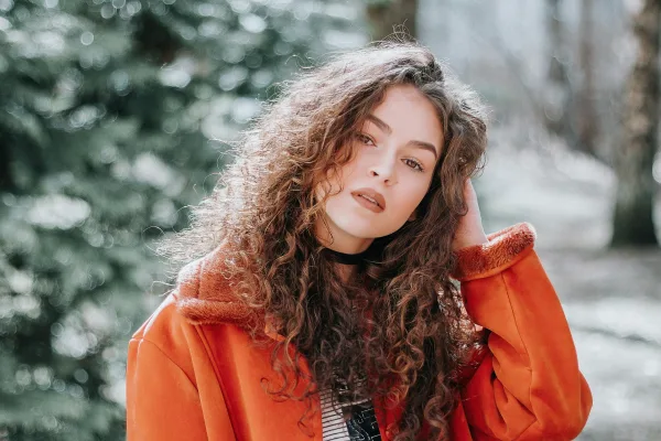 beautiful and gorgeous woman with curly hair