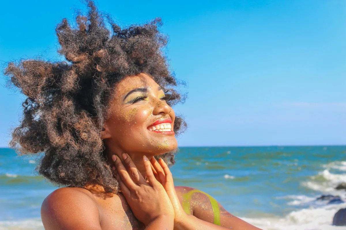 a black woman with wavy hair