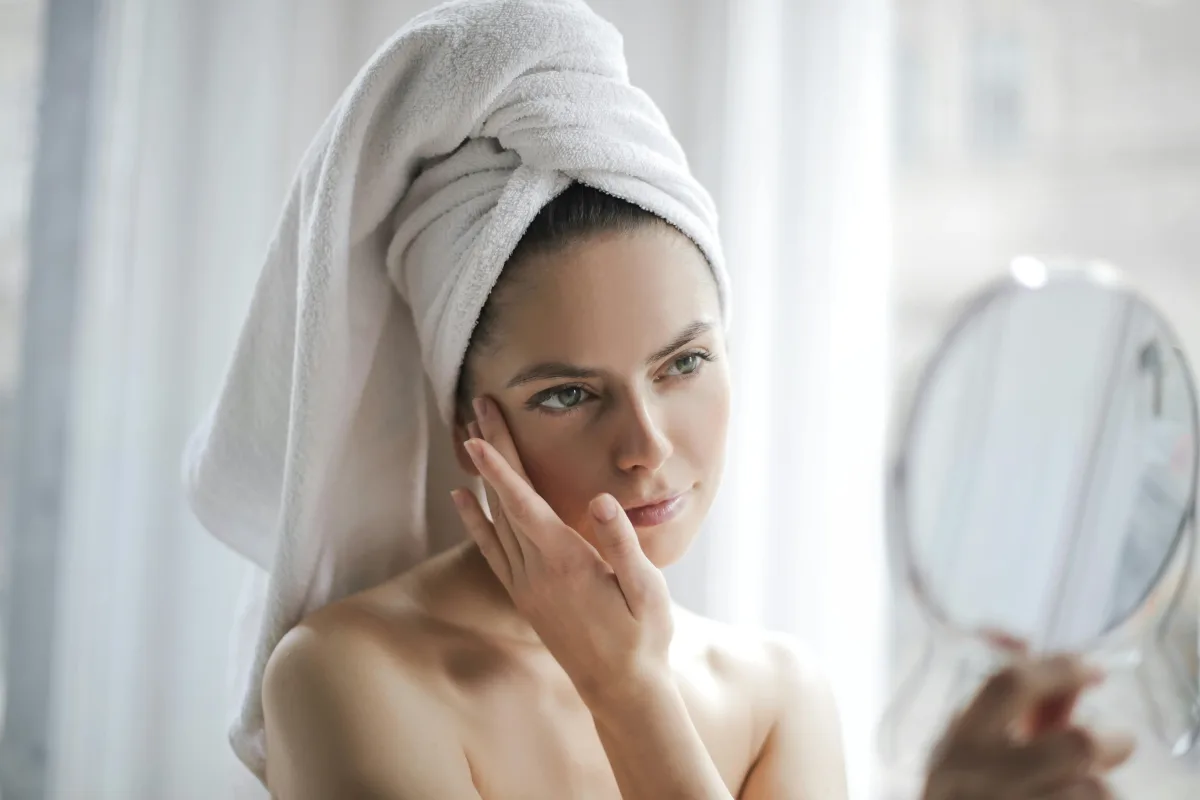 a woman doing skin care