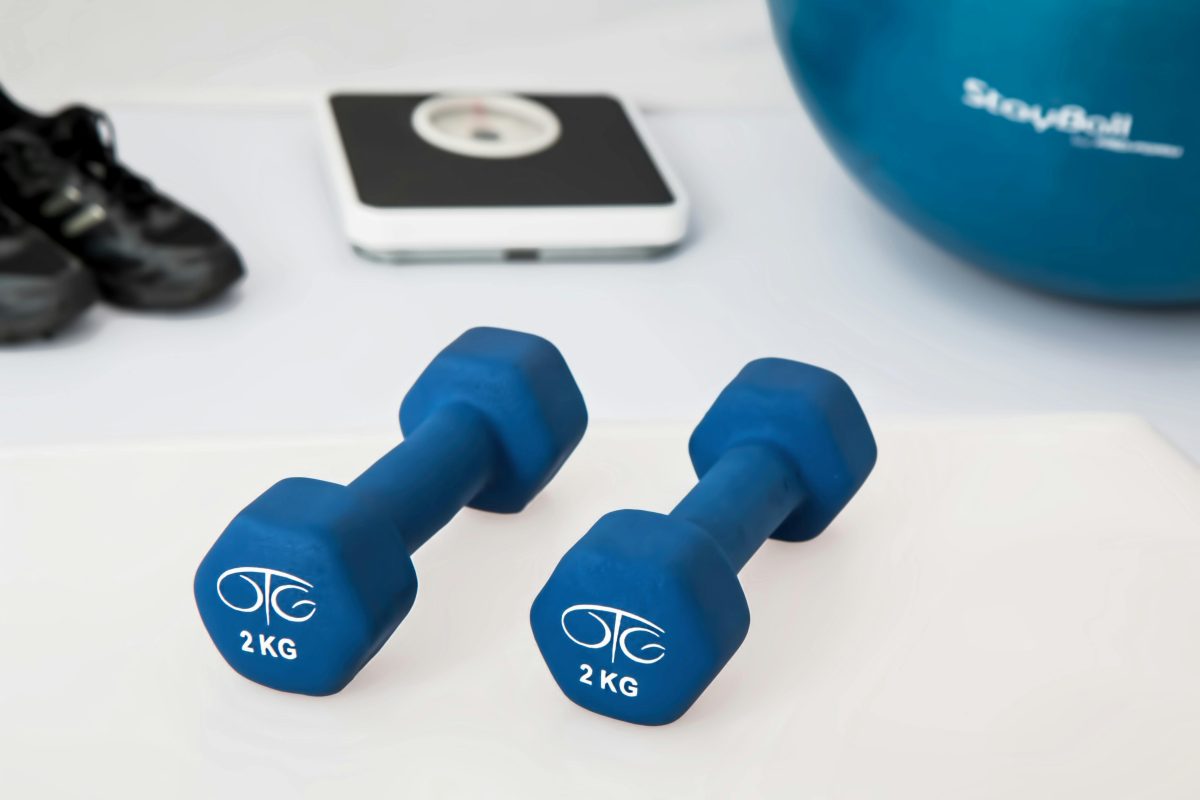 a set of small blue dumbells