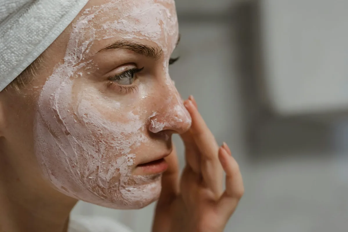 a woman doing skin care