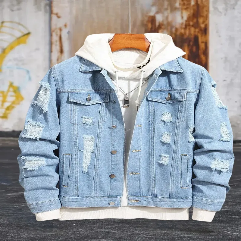 Front view of a Men's Blue Denim Jacket with a distressed design, layered over a white hoodie.