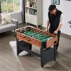 8Rod Table Football – a man playing indoors