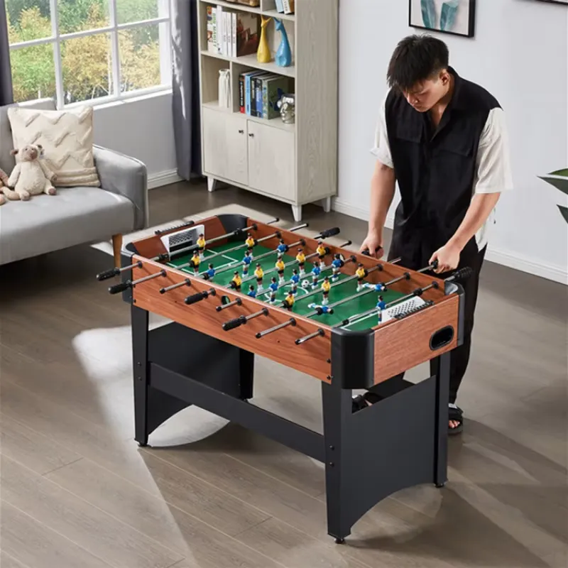 8Rod Table Football – a man playing indoors