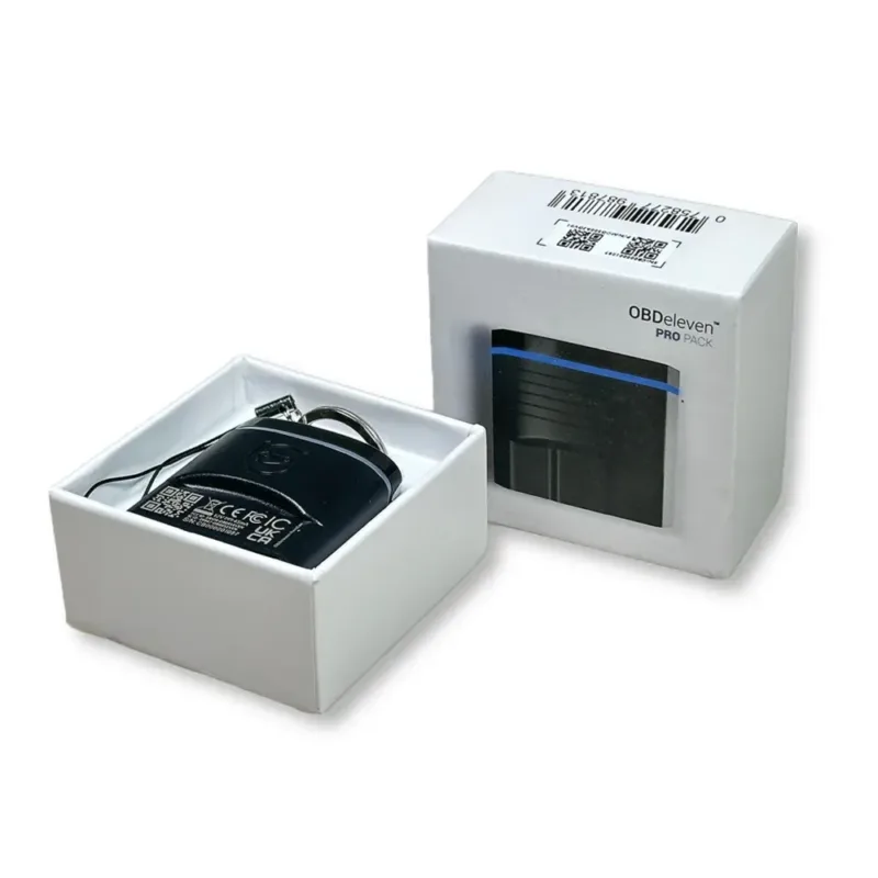 OBDeleven device placed on a mechanic’s workstation