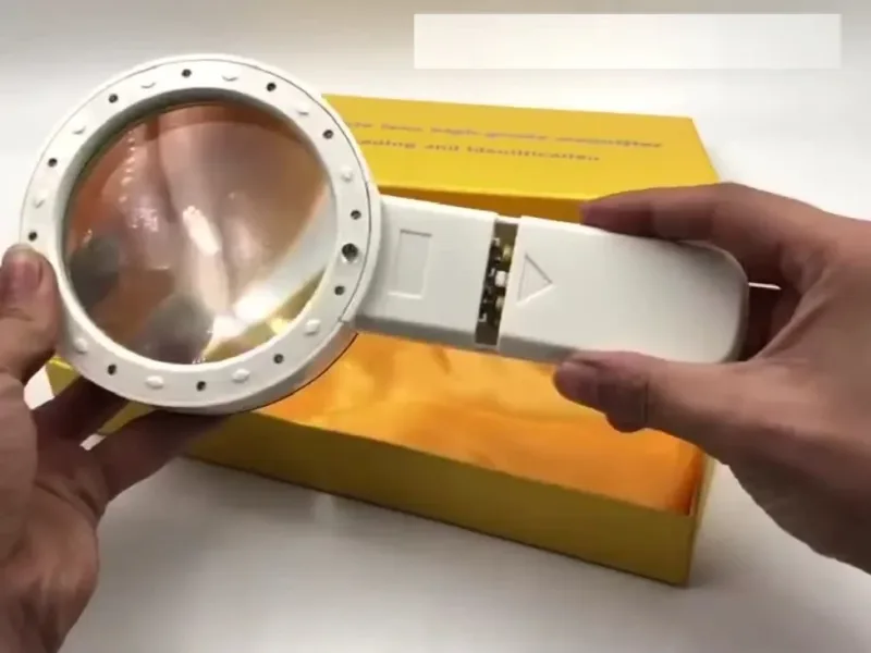 Handheld Magnifying Glass - a man take it in his hands