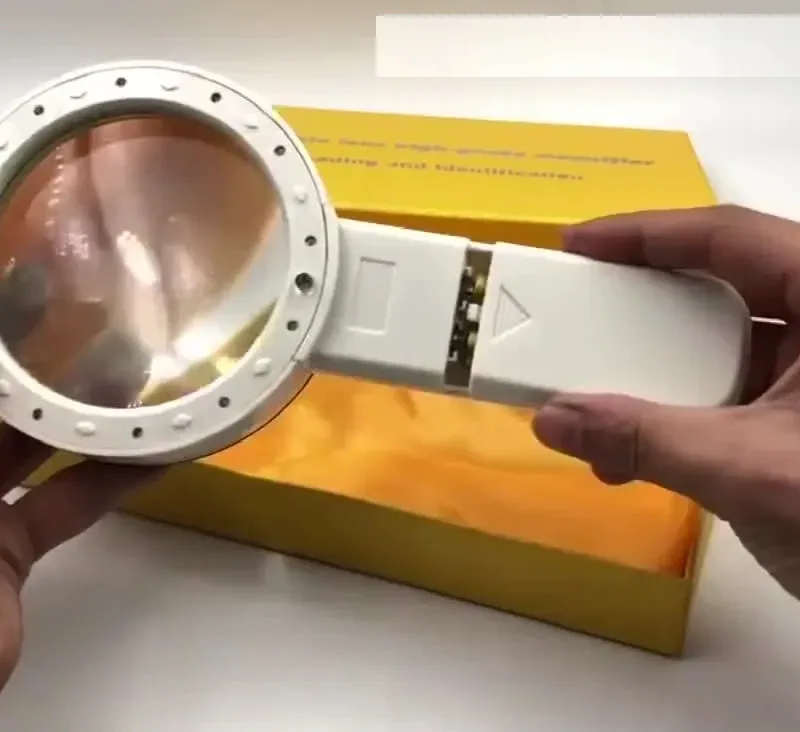 Handheld Magnifying Glass - a man take it in his hands