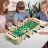Family Playing with Mini Wooden Table Football