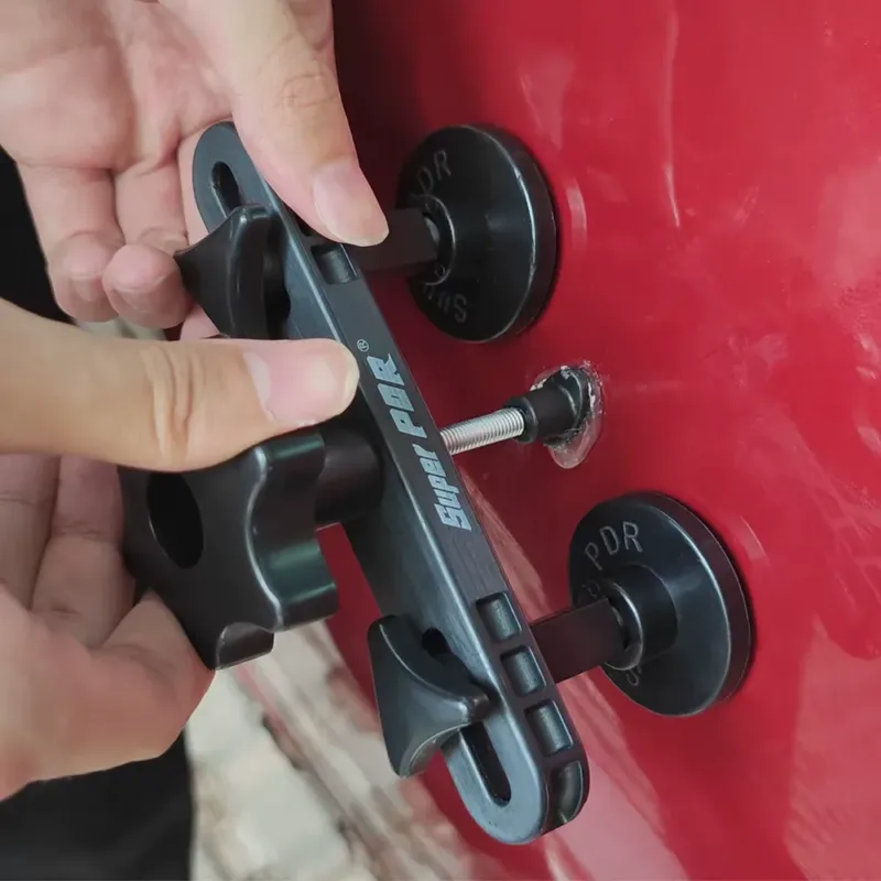 PDR Paintless Repair Tools – dent puller in action