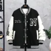 Classic black men's baseball jacket with a loose fit, showcasing bold 'N' lettering and white accents.