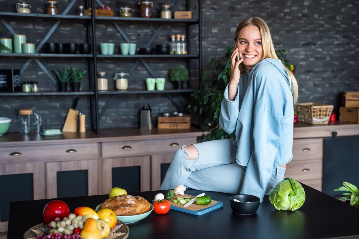 a girl on a kitchen furniture