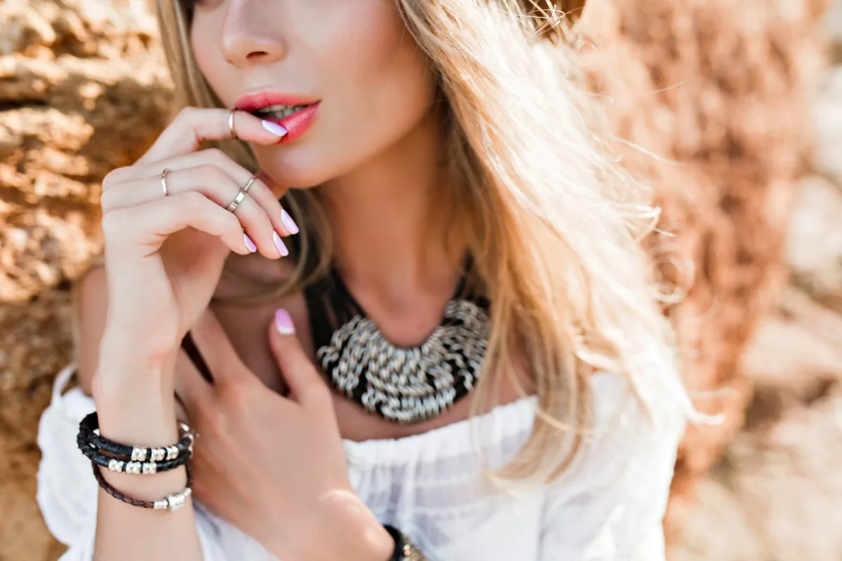 girl mixed types of neck lace and wristband