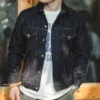 Man wearing a stylish Men Denim Jacket Slim, paired with a white graphic tee and green pants.