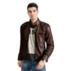 Model showcasing a stylish brown men's motorcycle leather jacket with a graphic tee and jeans.