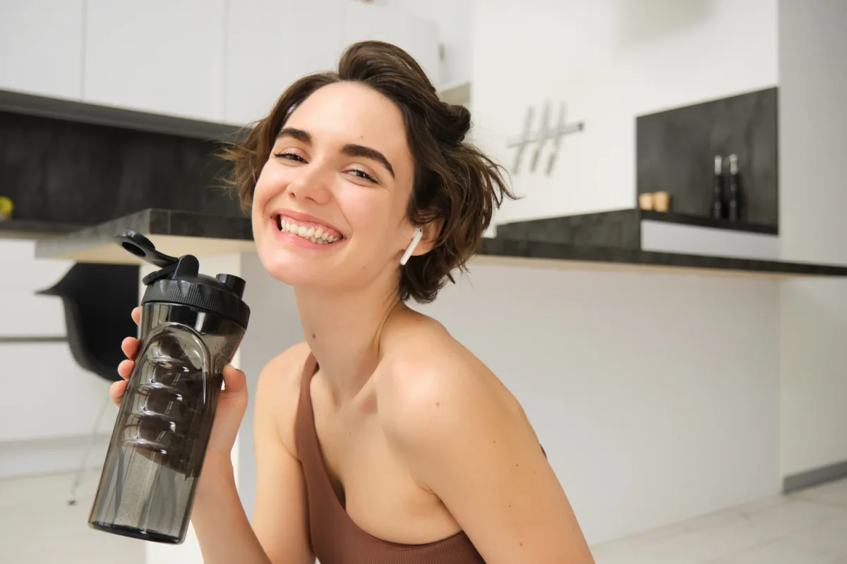 Hydrated smiling young and happy woman