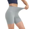 Women’s high-waisted gym shorts in light gray, featuring a sporty and comfortable design for active wear.