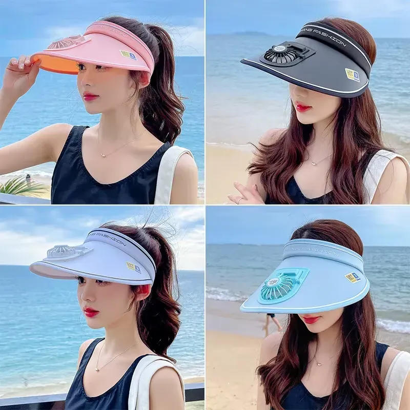 Woman wearing a wide-brim USB fan sun hat outdoors