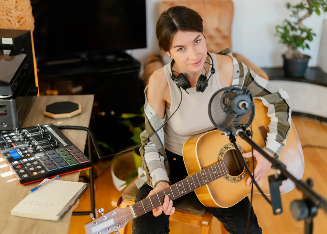 hot girl and a guitar on her hands