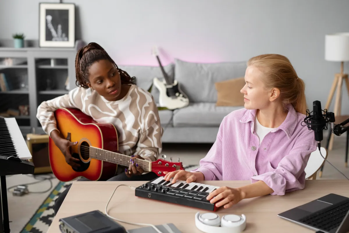 a girl with a acoustic guitar and another one 