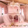 Girl Sliding Down Pink Princess Bunk Bed